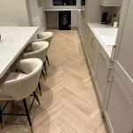 Desert oak herringbone dining room walkway
