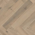Greige Oak Herringbone flooring close up