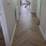Barley Herringbone SPC in hallway