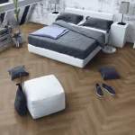 Truffle Oak Herringbone flooring in a bedroom